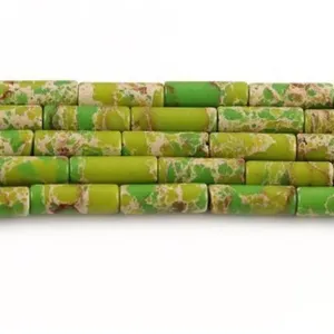 Detailed view of natural green picture jasper tube beads for DIY bracelet jewelry making.