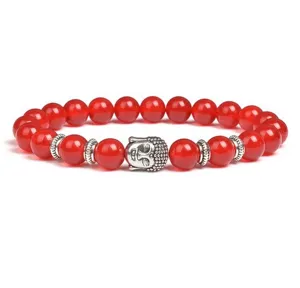 Red agate bead bracelet with silver Buddha head charm, detailed closeup view for men and women gift.