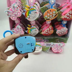 Detailed back view of mini handheld whack-a-mole game keychain with battery compartment