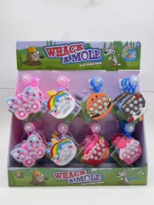 Retail display view showing multiple mini electronic whack-a-mole game keychains