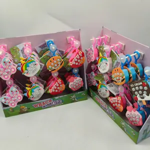 Detail showing a colorful collection of Whack-a-mole mini game keychains in retail display