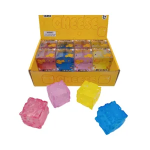 Colorful cheese cube squishy toy set for stress relief, 12 pieces in yellow display box.