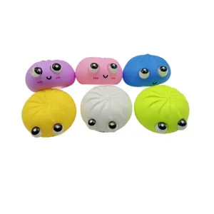 Set de juguetes antiestrés con forma de bollo de colores y ojos grandes para relajación