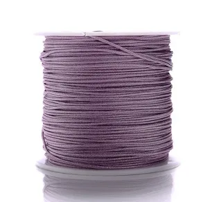 Gedetailleerd overzicht van een paarse nylon jade draadspoel, perfect voor DIY sieraden.