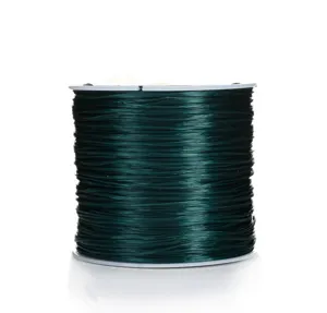 Dark green flat elastic beading thread detail showing fine texture and tight spool winding.