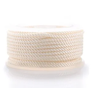 Close-up detail of the white twisted nylon cord spool, perfect for DIY crafting and jewelry.