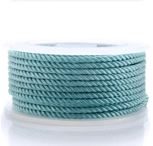 Light blue Milan cord spool for DIY handmade braided necklaces, bracelets and phone straps.