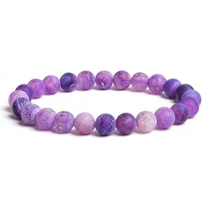 Purple weathered agate frosted round bead bracelet detail view showing unique texture.