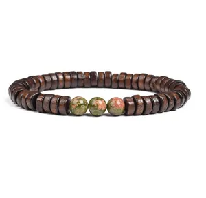 Close-up detail of wooden spacer beads and natural stone bracelet, smooth texture and natural design.