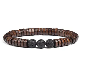 Detail view of wooden disc beads and black lava stone bracelet texture and natural material craft.