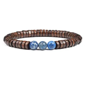 Wooden disc beads bracelet with central blue natural gemstone detailed close up view