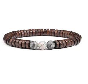 Close-up detail view of the wooden spacer beads and natural stone elements bracelet.