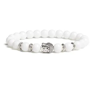 Detailed view of the 8mm white bead bracelet featuring a silver Buddha head charm.