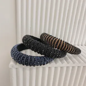 Close-up detail of three luxury Baroque padded headbands with sparkling crystal beads