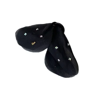Elegant black tulle bow hair claw clip with iridescent floral accents
