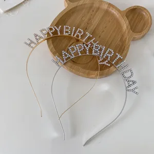 Detailed view of gold and silver rhinestone Happy Birthday headbands for party hair decor