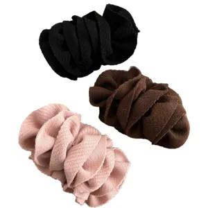 Set of three Korean style fabric ruffled banana hair clips in black, brown, and pink.