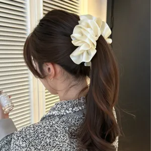 Elegant cream satin ruffled flower banana clip for a stylish ponytail hairstyle styling