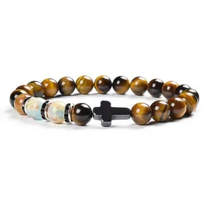 Detail shot of 8mm yellow tiger eye and chalcedony beaded bracelet featuring a black cross.