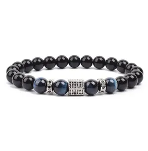 Close-up detail of the stylish beaded bracelet featuring blue tiger eye and micro-paved zirconia.