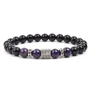 Close-up detail of the fashion beaded bracelet featuring black and purple beads with cubic zirconia.