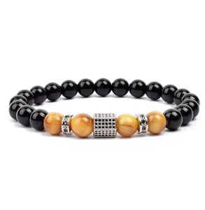 Classic beaded bracelet featuring black stones, tiger's eye beads, and micro-pave zircon.
