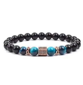 Fashion black and blue beaded bracelet with rose gold micro-pave cubic zirconia charms.