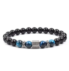 Charming blue tiger eye stone and black bead bracelet with micro pave zircon metal charms.