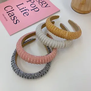 Detail showing four Baroque padded headbands with sparkling crystal beads in various colors