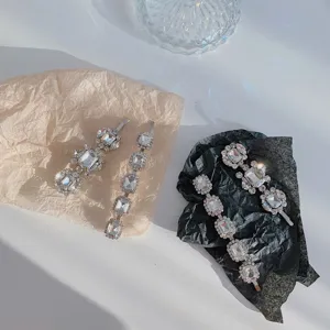 Close-up view showing the intricate details of sparkling crystal hair accessories