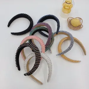 Group display of Baroque style wide headbands featuring colorful rhinestones and beads
