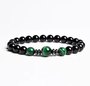 Natural stone beaded bracelet with black onyx and green tiger eye beads for daily wear.
