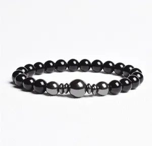 Black beaded detail bracelet with metallic spacer beads closeup view for men and women
