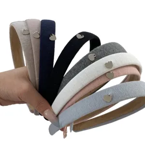 Collection of French vintage high-top fabric headbands featuring cute metal heart charms