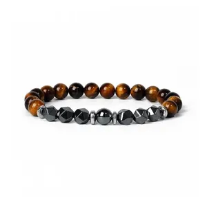 Close-up of beaded bracelet with tiger's eye and hematite stones, detail view.