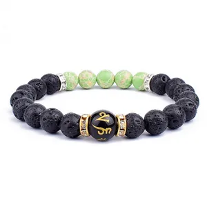 Bracelet en pierre volcanique avec perles vertes et strass, mantra pour cadeaux spirituels.