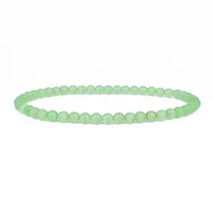 Detailed view of the 4mm light green cat's eye stone beaded bracelet, elegant and delicate.