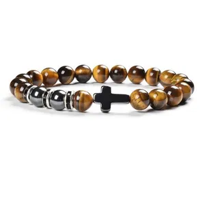 Tiger's eye gemstone bracelet with cross charm and hematite accents for daily wear.