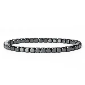 Detailed view of the dark metallic hematite cube bead bracelet, showing sleek geometric shape.
