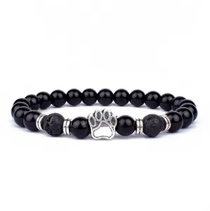 Zwarte lavasteen en agaat kraal armband met zilveren poot bedel voor yoga en dagelijks.