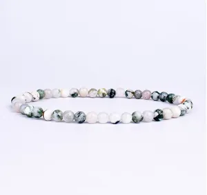 Natural stone bead bracelet featuring 4mm multi-color round gemstones with unique patterns.