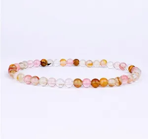 Closeup of 4mm colorful gemstone bead bracelet, elegant multi-color yoga bracelet.