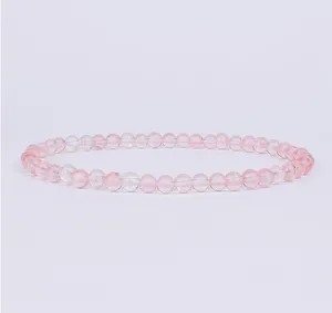 Detail view of the pink crystal beaded bracelet, highlighting the delicate 4mm translucent stone beads.