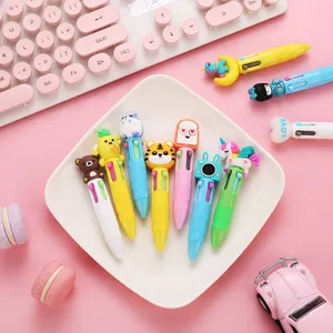 Cute mini 4-color ballpoint pens with cartoon animal toppers, perfect for school students and journaling.