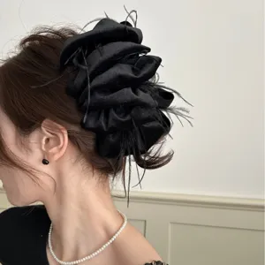 Oversized black satin cloud bubble hair claw clip with elegant feather details for women