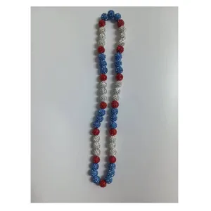 Close-up detail of 10mm red, white, and blue Shamballa rhinestone bead stretch necklace