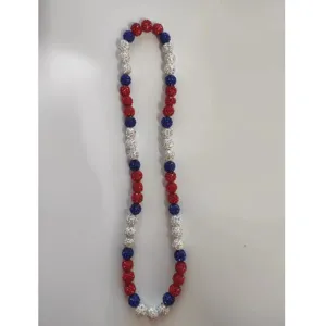 Detailed view of red white and blue sparkly rhinestone clay ball shamballa necklace