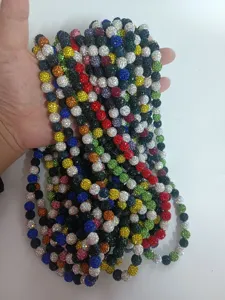 Detailed close-up of multi-color 10mm Shamballa clay disco ball beads on elastic cords