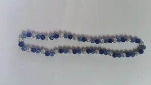 Detail view of 10mm sparkling clay disco ball rhinestone beads on a Shamballa necklace