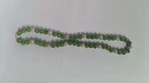 Detailed view of 10mm green and white Shambhala pave crystal disco ball beads set.